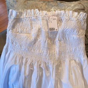NWOT. Just in time for summer. White cotton calf length strapless, ruffle bodice